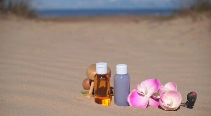 Composition with massage, treatment and body care products near sea or ocean.Banner.