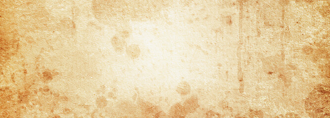 Vintage beige paper texture in spots with a light center