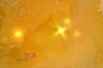 Vinatge shining abstract honey yellow, and gold marble pattern with sparkles. Vector background in alcohol ink technique with glitter. Template for banner, poster design. Fluid art painting