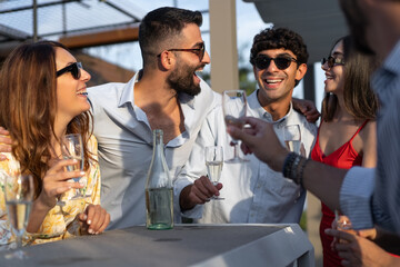 Group of friends enjoying with cocktail drinks