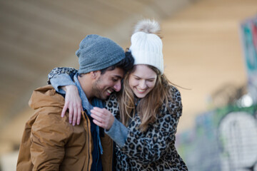 Happy young couple hugging