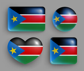 Glossy buttons with South Sudan country flag set. African republic national flag, shiny geometric shape badges. South Sudan symbols in patriotic colors realistic vector illustration