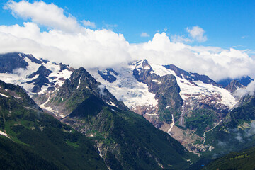 Fototapeta na wymiar The Caucasus Mountains. Mountain peaks in summer.