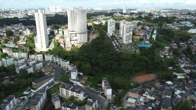 salvador, bahia, brazil - september 9, 2021: aerial view of popular favela houses in the Engomadeira neighborhood in the city of Salvador.