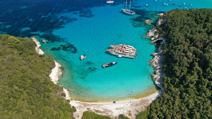 Obraz premium Aerial drone photo of beautiful azure exotic turquoise beach of Vrika in island of Antipaxos, Ionian, Greece