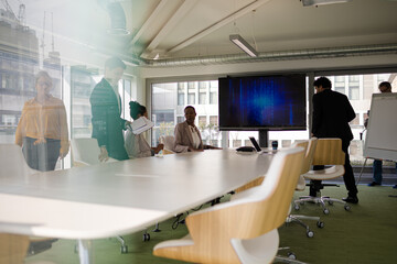 Business people in conference room meeting