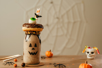 Freak Monster shake decorated with chocolate donut and marmelade eye