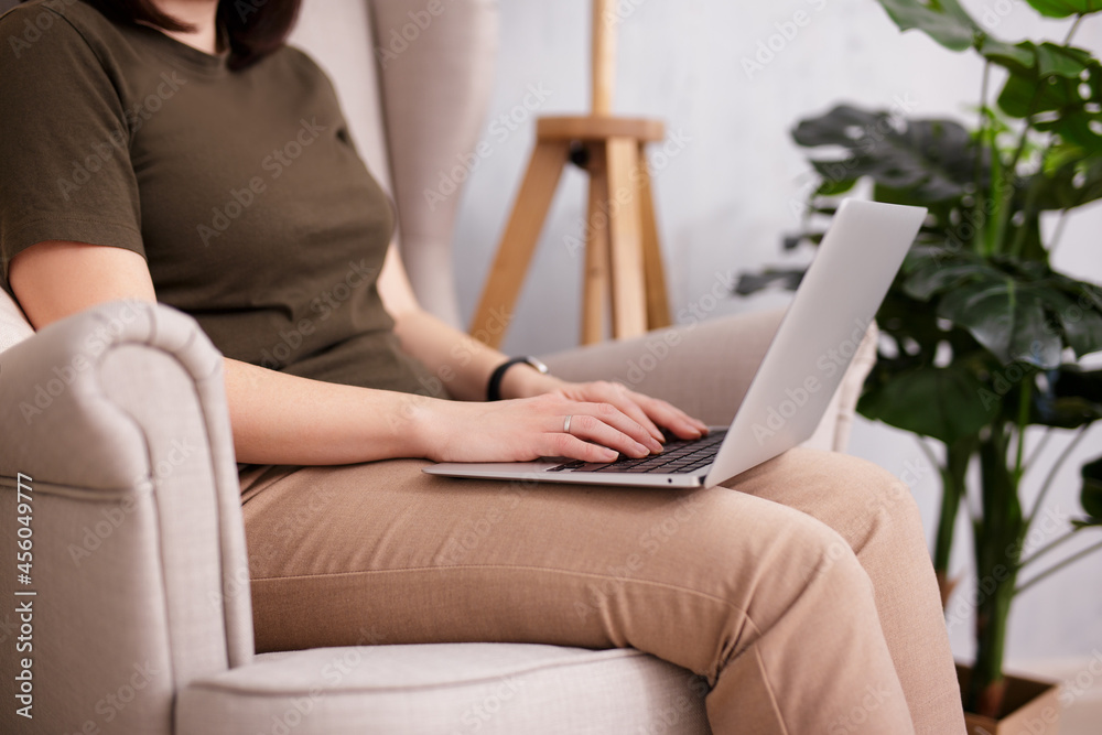 Canvas Prints close up of young woman using laptop at home