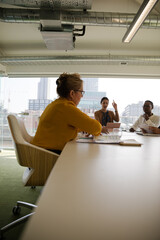 Business people brainstorming in conference room