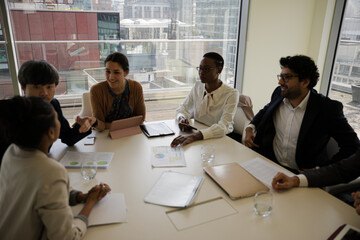 Happy business people celebrating success in office