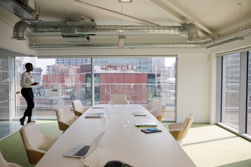 Business people gathering ion conference room