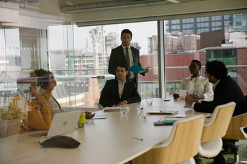 Businessman leading conference room meeting