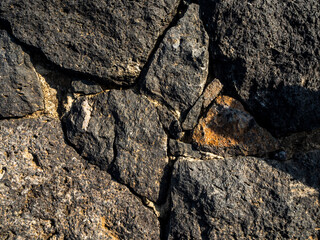 texture detail wall black volcanic stone