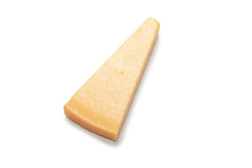 Half of parmigiano cheese isolated on a white background.