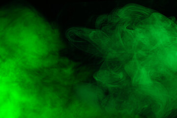 Green steam on a black background.
