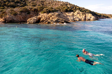 snorkeling in Cala Dell'amore, La Maddalena, turquoise waters