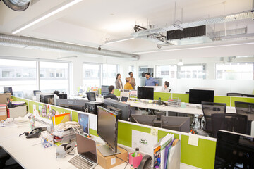 Business people meeting in open plan office