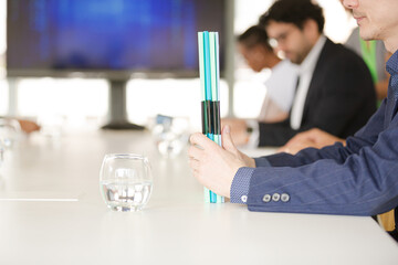 Portrait of businessman in conference room meeting