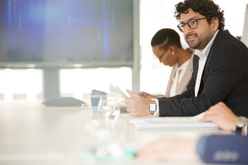 Portrait of businessman in conference room meeting