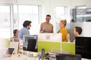 Business people meeting in open plan office