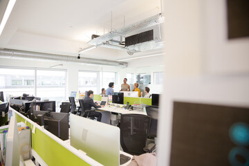 Business people meeting in open plan office
