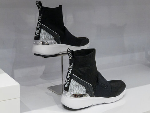 Pair of Micheal Kors Skyler Stretch Knit and Two-Tone Logo Sock Sneakers