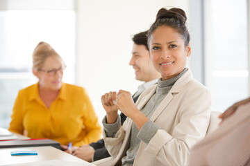 Fototapeta premium Portrait of smiling businesswoman in conference room meeting
