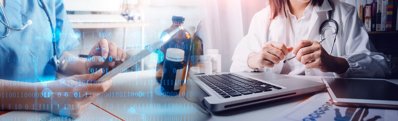 Health care researchers working in life science laboratory and analyzing microscope slides in...