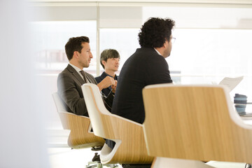 Businessmen in conference room meeting