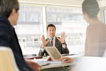 Business people in conference room meeting