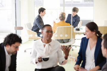 Business people brainstorming in relax zone