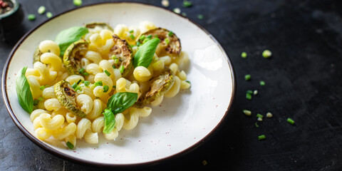 pasta zucchini vegetable and macaroni no meat fresh portion meal snack on the table copy space food background rustic top view veggie vegan or vegetarian food