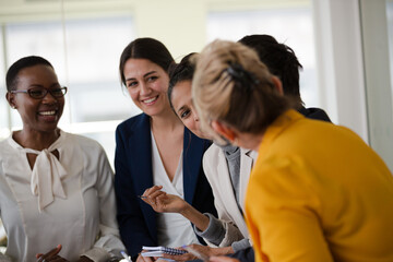 Enthusiastic business people working together in relax zone