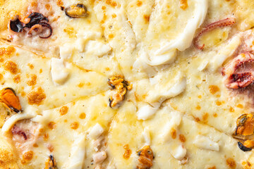 pizza seafood mussels, shrimps, octopus, scallop, cheese fresh portion ready to eat meal snack on the table copy space food background rustic. top view