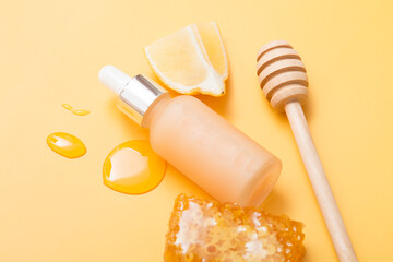 Fototapeta na wymiar Natural cosmetic products on a yellow background. Cosmetic bottle mockup.