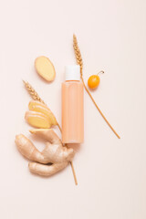 Natural cosmetic products on a beige background. Cosmetic bottle mockup.