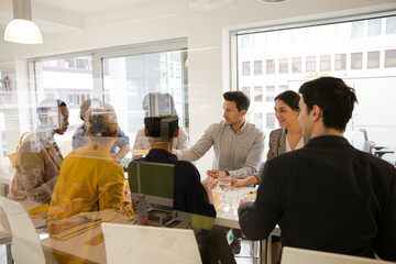 Business people enjoying sushi lunch