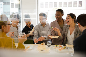 Fototapeta premium Business people enjoying sushi lunch
