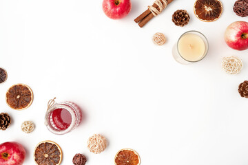 Autumn flat lay composition of apples, fall foods and decor on white background. Ingredients for jam or mulled wine. Autumn or winter holiday food concept. Creative trendy flat lay with place for text