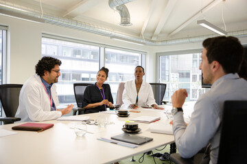 Business people in conference room meeting