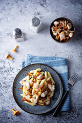 Chanterelle onion fried creamy pasta in a plate