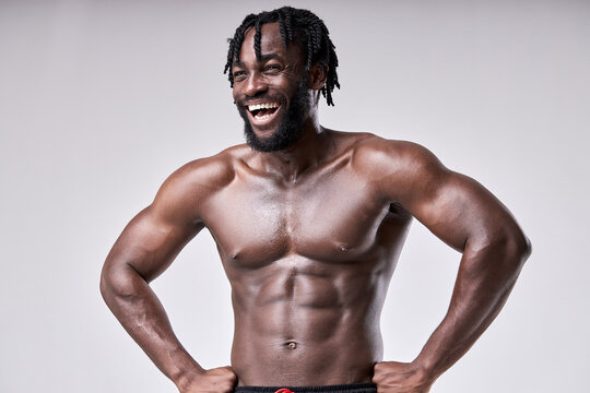 Nice Guy Showing Perfect Body, Shirtless Male Having Muscular Torso And Arms, Posing At Camera Isolated On White Studio Background. Well-built Guy With Beard Engaged In Sport, Lead Healthy Lifestyle