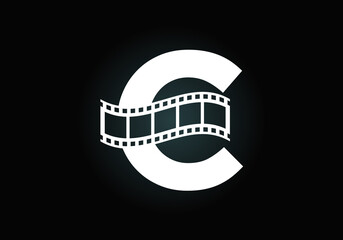 Fototapeta na wymiar Initial C monogram alphabet incorporated with film reel. Video and movie logo concept. Font emblem. Logo for the entertainment business and company identity