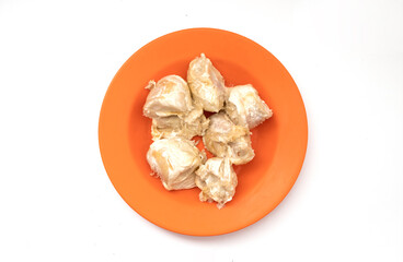 durian fruit on a plastic plate isolated on a white background