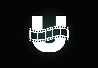 Fototapeta na wymiar Initial U monogram alphabet incorporated with film reel. Video and movie logo concept. Font emblem. Logo for the entertainment business and company identity
