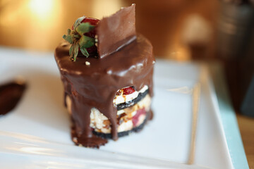 Closeup of appetizing delicious dessert with chocolate and strawberries