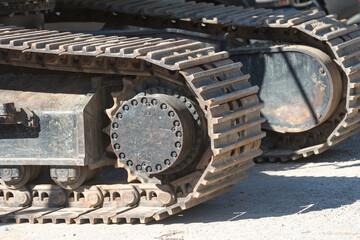 Fototapeta na wymiar heavy duty machinery detail (tractor wheels) at a construction site