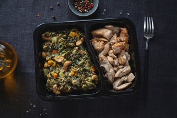 Green kale salad with chicken in lunch box