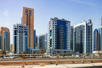 Obraz na płótnie Canvas Urban road cityscape of Dubai at daytime