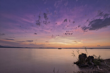 Landscape of the sea with long exposure during a beautiful purple sky